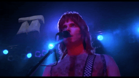 Clip from This is Spinal Tap showing a tiny stonehenge model descending from above and being danced around by little people.